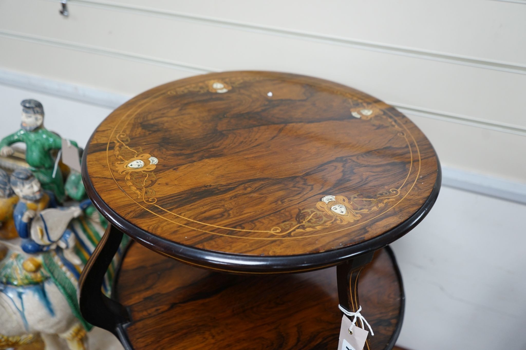 An Edwardian marquetry inlaid rosewood circular two tier centre table, diameter 47cm, height 69cm